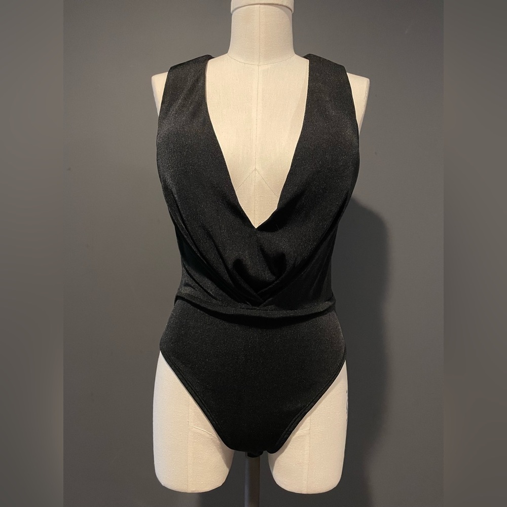 Bodysuit with breast padding